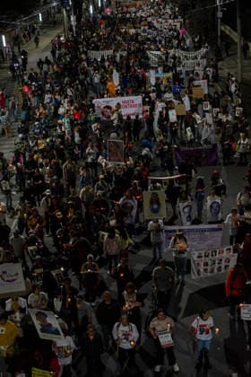 Mexico City Missing Persons March A wide view shows relatives of missing persons and supporters marching with candles and banners in Mexico City, Mexico, on June 10, 2026. The march, heading toward Estadio Azteca as part of the Let s illuminate the search event, brought together families from various Mexican states calling for justice for their missing relatives. Mexico City Mexico City Mexico Copyright: xXavierxDuartex