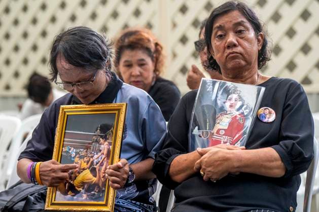 June 12, 2026, Bangkok, Bangkok, Thailand: Members of the Thai public sit and hold portraits of HRH Princess Bajrakitiyabha inside Chulalongkorn hospital while mourning her passing which took place the previous evening. Princess Bajrakitiyabha had been hospitalized since December, 2022 after suffering a cardiac episode while training her pet dog. Bangkok Thailand - ZUMAt128 20260612_zap_t128_002 Copyright: xAdryelxTalamantesx