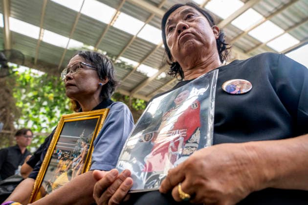 June 12, 2026, Bangkok, Bangkok, Thailand: Members of the Thai public sit and hold portraits of HRH Princess Bajrakitiyabha inside Chulalongkorn hospital while mourning her passing which took place the previous evening. Princess Bajrakitiyabha had been hospitalized since December, 2022 after suffering a cardiac episode while training her pet dog. Bangkok Thailand - ZUMAt128 20260612_zap_t128_003 Copyright: xAdryelxTalamantesx