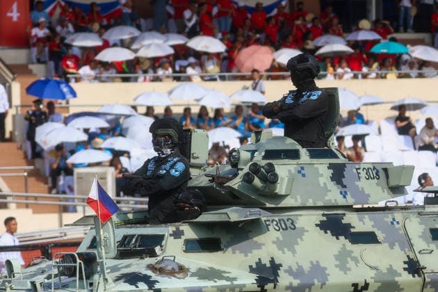 Philippines holds military parade to mark 128th Independence Day MANILA, PHILIPPINES - JUNE 12: Special police officers manoeuvre an armored vehicle, during a military parade marking the 128th anniversary of Independence Day, in Manila, Philippines, on June 12, 2026. The military parade, which is consisted of the Air Force, Army and Navy and other forces, features different weapons and military assets, including the Israel-made The SPYDER Surface-to-air Missile Systems and Sabrah light tanks. It comes at a time of heightened tensions between Beijing and Manila in the South China Sea. Daniel Ceng Anadolu Manila Philippines. Editorial use only. Please get in touch for any other usage.  Copyright: x2026xAnadoluxDanielxCengx