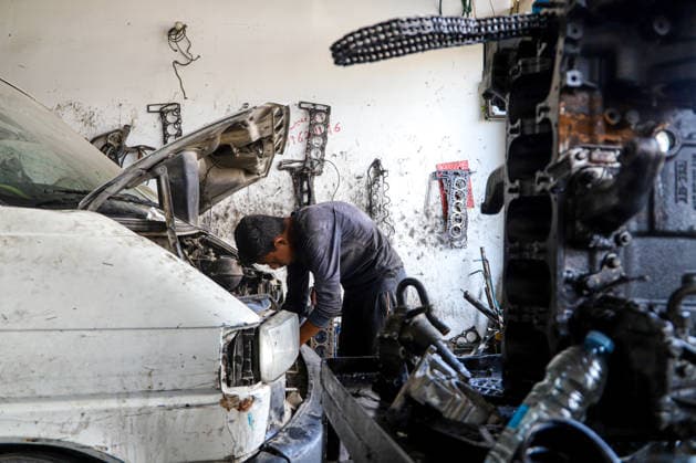 World Day Against Child Labour in Gaza GAZA CITY, GAZA, PALESTINE - JUNE 11: 12-year-old Palestinian Sami Ibrahim Hammad, who lost his father in Israeli attacks on Gaza, works long hours at an auto repair shop to support himself and his family instead of continuing his education during the World Day Against Child Labour on June 12, 2026 in Gaza City, Gaza, Palestine. Khalil Ramzi Alkahlut Anadolu Gaza City Gaza. Editorial use only. Please get in touch for any other usage.  Copyright: x2026xAnadoluxKhalilxRamzixAlkahlutx