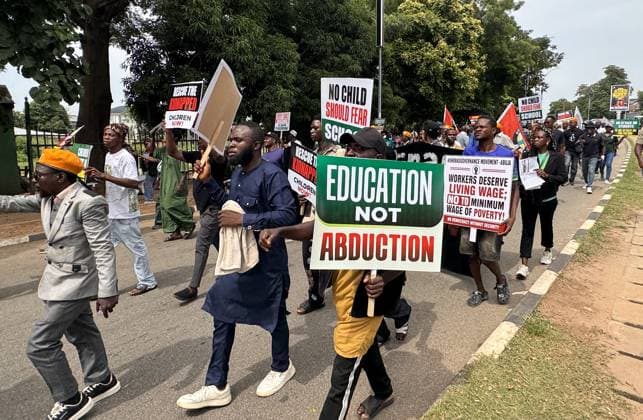 Protesters rally against security and economic challenges on Nigeria s Democracy Day ABUJA, NIGERIA - JUNE 12: Protesters gather during a demonstration marking Democracy Day, voicing concerns over worsening security and economic challenges in Abuja, Nigeria, on June 12, 2026. Demonstrators chanted anti-government slogans and carried banners highlighting growing insecurity, mass abductions of students from schools and ongoing economic hardships. Adam Abu-bashal Anadolu Abuja Nigeria. Editorial use only. Please get in touch for any other usage.  Copyright: x2026xAnadoluxAdamxAbu-bashalx