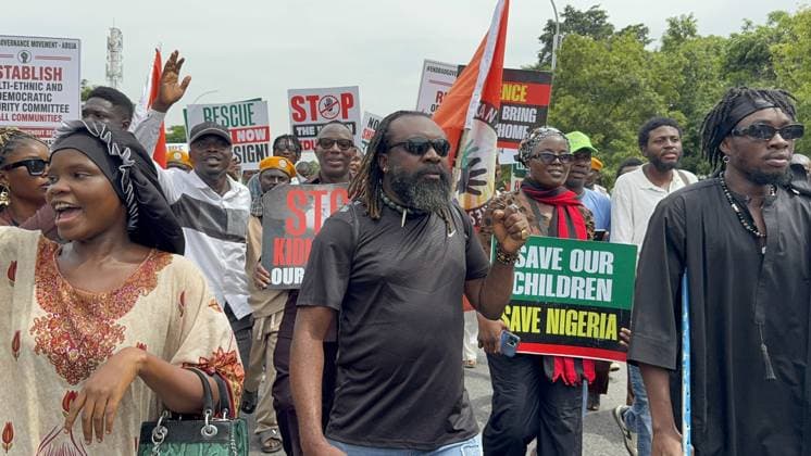 Protesters rally against security and economic challenges on Nigeria s Democracy Day ABUJA, NIGERIA - JUNE 12: Protesters gather during a demonstration marking Democracy Day, voicing concerns over worsening security and economic challenges in Abuja, Nigeria, on June 12, 2026. Demonstrators chanted anti-government slogans and carried banners highlighting growing insecurity, mass abductions of students from schools and ongoing economic hardships. Adam Abu-bashal Anadolu Abuja Nigeria. Editorial use only. Please get in touch for any other usage.  Copyright: x2026xAnadoluxAdamxAbu-bashalx