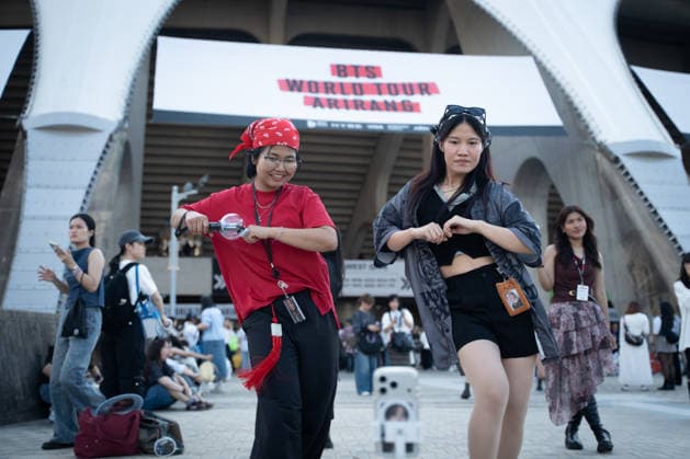Fans gather ahead of BTS World Tour Arirang in South Korea s Busan BUSAN, SOUTH KOREA - JUNE 12: Fans are dancing and filming videos in front of Busan Asiad Main Stadium, the venue for BTS World Tour Arirang , in Busan, South Korea on June 12, 2026. Hwawon Ceci Lee Anadolu Busan South Korea. Editorial use only. Please get in touch for any other usage.  Copyright: x2026xAnadoluxHwawonxCecixLeex