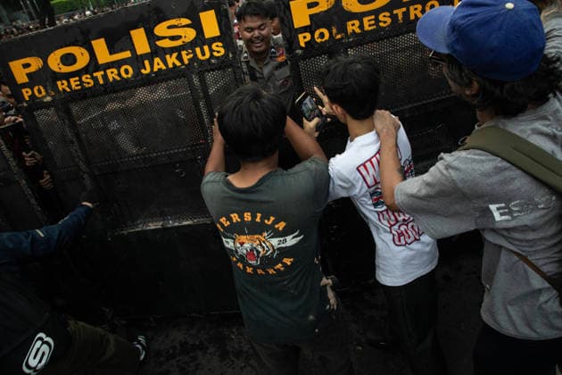 June 12, 2026, Jakarta, Jakarta, Indonesia: tudents from the Universitas Indonesia (UI) campus held a long march demonstration from the Jalan Sudirman area toward Jalan M.H. Thamrin, Jakarta, on Friday (12 06 2026). The crowd, consisting of members from the Student Executive Board of Universitas Indonesia (BEM UI) and the Student Executive Board of the Student Family of IPB University (BEM KM IPB), highlighted the economic slowdown, rising prices of basic commodities and fuel (BBM), as well as the forced implementation of the free nutritious meal program which they argue is draining the State Budget (APBN). The students also put a spotlight on the utilization of the State Budget (APBN). In their call to action, the UI Extended Family critic  - ZUMAh128 20260612_zap_h128_013 Copyright: xDonalxHusnix