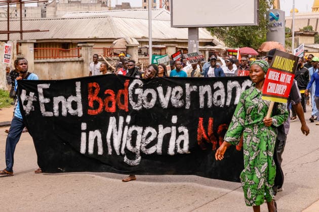 Protest held on Democracy Day over security and economic crisis in Nigeria ABUJA, NIGERIA - JUNE 12: People chanting slogans against the government and carrying banners attend a protest held on June 12 Democracy Day against rising security and economic problems in Abuja, Nigeria, on June 12, 2026. In the demonstration, which saw high participation, protesters expressed their reaction to increasing security issues in the country, mass kidnappings of students from schools, and economic hardship. Emmanuel Osodi Anadolu Abuja Nigeria. Editorial use only. Please get in touch for any other usage.  Copyright: x2026xAnadoluxEmmanuelxOsodix
