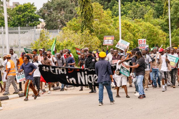 Protest held on Democracy Day over security and economic crisis in Nigeria ABUJA, NIGERIA - JUNE 12: People chanting slogans against the government and carrying banners attend a protest held on June 12 Democracy Day against rising security and economic problems in Abuja, Nigeria, on June 12, 2026. In the demonstration, which saw high participation, protesters expressed their reaction to increasing security issues in the country, mass kidnappings of students from schools, and economic hardship. Emmanuel Osodi Anadolu Abuja Nigeria. Editorial use only. Please get in touch for any other usage.  Copyright: x2026xAnadoluxEmmanuelxOsodix