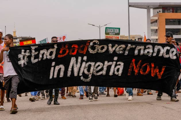 Protest held on Democracy Day over security and economic crisis in Nigeria ABUJA, NIGERIA - JUNE 12: People chanting slogans against the government and carrying banners attend a protest held on June 12 Democracy Day against rising security and economic problems in Abuja, Nigeria, on June 12, 2026. In the demonstration, which saw high participation, protesters expressed their reaction to increasing security issues in the country, mass kidnappings of students from schools, and economic hardship. Emmanuel Osodi Anadolu Abuja Nigeria. Editorial use only. Please get in touch for any other usage.  Copyright: x2026xAnadoluxEmmanuelxOsodix