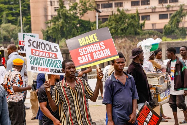 Protest held on Democracy Day over security and economic crisis in Nigeria ABUJA, NIGERIA - JUNE 12: People chanting slogans against the government and carrying banners attend a protest held on June 12 Democracy Day against rising security and economic problems in Abuja, Nigeria, on June 12, 2026. In the demonstration, which saw high participation, protesters expressed their reaction to increasing security issues in the country, mass kidnappings of students from schools, and economic hardship. Emmanuel Osodi Anadolu Abuja Nigeria. Editorial use only. Please get in touch for any other usage.  Copyright: x2026xAnadoluxEmmanuelxOsodix