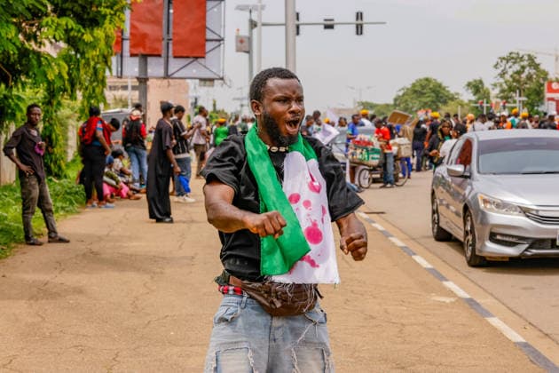 Protest held on Democracy Day over security and economic crisis in Nigeria ABUJA, NIGERIA - JUNE 12: People chanting slogans against the government and carrying banners attend a protest held on June 12 Democracy Day against rising security and economic problems in Abuja, Nigeria, on June 12, 2026. In the demonstration, which saw high participation, protesters expressed their reaction to increasing security issues in the country, mass kidnappings of students from schools, and economic hardship. Emmanuel Osodi Anadolu Abuja Nigeria. Editorial use only. Please get in touch for any other usage.  Copyright: x2026xAnadoluxEmmanuelxOsodix