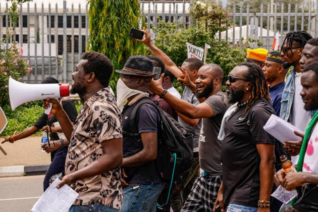 Protest held on Democracy Day over security and economic crisis in Nigeria ABUJA, NIGERIA - JUNE 12: People chanting slogans against the government and carrying banners attend a protest held on June 12 Democracy Day against rising security and economic problems in Abuja, Nigeria, on June 12, 2026. In the demonstration, which saw high participation, protesters expressed their reaction to increasing security issues in the country, mass kidnappings of students from schools, and economic hardship. Emmanuel Osodi Anadolu Abuja Nigeria. Editorial use only. Please get in touch for any other usage.  Copyright: x2026xAnadoluxEmmanuelxOsodix