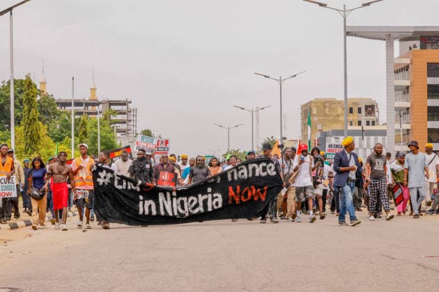 Protest held on Democracy Day over security and economic crisis in Nigeria ABUJA, NIGERIA - JUNE 12: People chanting slogans against the government and carrying banners attend a protest held on June 12 Democracy Day against rising security and economic problems in Abuja, Nigeria, on June 12, 2026. In the demonstration, which saw high participation, protesters expressed their reaction to increasing security issues in the country, mass kidnappings of students from schools, and economic hardship. Emmanuel Osodi Anadolu Abuja Nigeria. Editorial use only. Please get in touch for any other usage.  Copyright: x2026xAnadoluxEmmanuelxOsodix