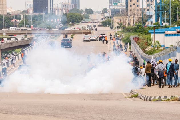 Protest held on Democracy Day over security and economic crisis in Nigeria ABUJA, NIGERIA - JUNE 12: Security forces use tear gas to disperse the protesters as people chanting slogans against the government and carrying banners attend a protest held on June 12 Democracy Day against rising security and economic problems in Abuja, Nigeria, on June 12, 2026. Emmanuel Osodi Anadolu Abuja Nigeria. Editorial use only. Please get in touch for any other usage.  Copyright: x2026xAnadoluxEmmanuelxOsodix
