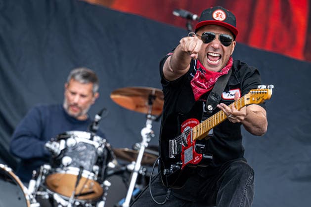 American musicians Tom Morello (right) and his son Roman Morello (not seen) perform within the Rock for People music festival in Hradec Kralove, Czech Republic, June 12, 2026. (CTKxPhoto DavidxTanecek) CTKPhotoP2026061206924  CTKPhotoP2026061206924