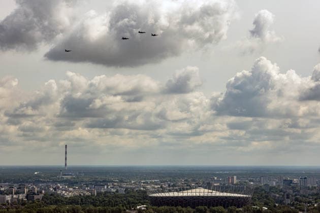 June 12, 2026, Warsaw, Mazovia, Poland: The F-35 jets fly along the Vistula river, past the National Stadium. On the morning of the 12th of June, 2 F-35 Husarz fighter jets fly over the city of Warsaw escorted by F-16s. As part of the Welcome to Poland for the new line of fighter aeroplanes, the F-35s are the first to fly in Poland during a ceremonial flyover. The jets were delivered to the Polish Air Force in May as part of a 4.6 Billion dollar deal. The Jets travel the length of the country passing through Gdansk, Warsaw, and Krakow. Warsaw Poland - ZUMAs197 20260612_aab_s197_010 Copyright: xNeilxMiltonx