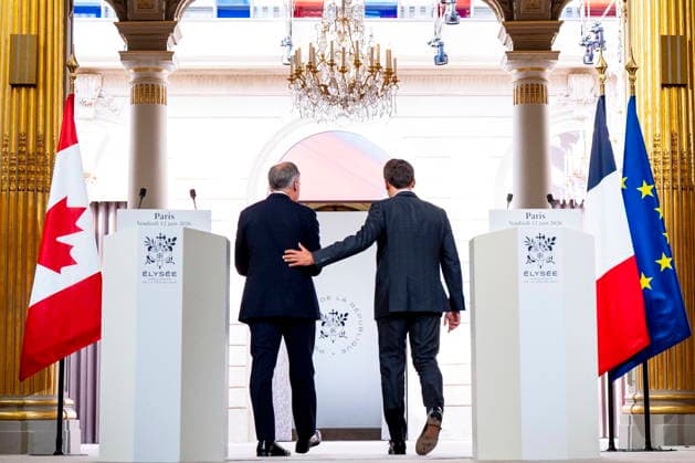 June 12, 2026, Paris, France: Canadian Prime Minister Mark Carney, left, and French President Emmanuel Macron exit after giving remarks at the Palais de löÄÃ Elysee in Paris, on Friday, June 12, 2026. Paris France  - ZUMAc35_ 20260612_zaf_c35_074 Copyright: xChristopherxKatsarovx