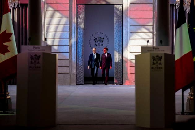 June 12, 2026, Paris, France: Canadian Prime Minister Mark Carney, left, and French President Emmanuel Macron arrive to give emarks at the Palais de löÄÃ Elysee in Paris, on Friday, June 12, 2026. Paris France  - ZUMAc35_ 20260612_zaf_c35_075 Copyright: xChristopherxKatsarovx