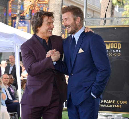 Retired British soccer star David Beckham (R) is joined by actor Tom Cruise during an unveiling ceremony honoring him with the 2,849th star on the Hollywood Walk of Fame in Los Angeles on Friday, June 12, 2026.  LAP2026061205 JIMxRUYMEN