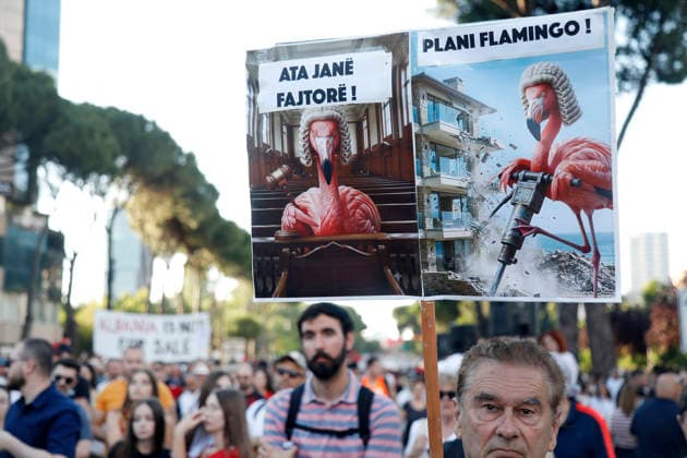 Protest against the construction of a luxury resort in Tirana, Albania. Protesters hold signs and Albanian national flags as they take part in a demonstration in front of the prime minister s office in Tirana on June 12, 2026, opposing the construction of a luxury resort in a protected natural area near the city of Vlore. Several thousand citizens demonstrated in Tirana for the 13th consecutive night to demand transparency on a luxury tourism complex project in the protected area of Narta Lagoon in the city of Vlore linked to US President Donald Trump s son-in-law Jared Kushner and his wife, Ivanka Trump. The project was planned for two areas along the Adriatic coast, the protected delta area of Vjosa-Narta and the nearby uninhabited island Copyright: xLightxStudioxAgencyx xMaltonxDibrax