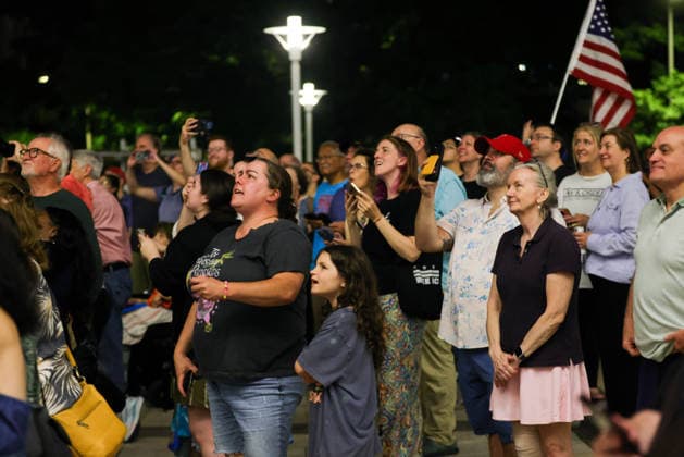 June 13, 2026, Washington, District Of Columbia, USA: Onlookers await the removal of U.S. President Donald Trump s name fromÃ‚ the facade of the John F. Kennedy Center for the Performing Arts in Washington, D.C. on June 13, 2026. The Trump administration was ordered to remove the Trump name from the building following a court order and failed appeals by the Kennedy Center board. As of midnight, the President s name remained on the building. Washington USA - ZUMAd227 20260613_znp_d227_002 Copyright: xBryanxDozierx