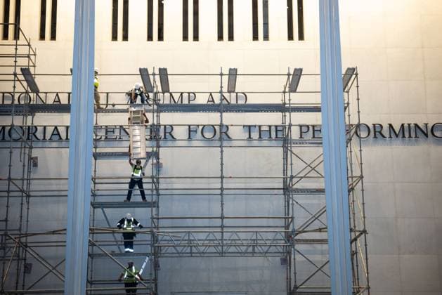 Crowds watch removal of Trump™s name from Kennedy Center WASHINGTON, DC, USA - JUNE 13: Hundreds of people watch crews prepare to remove U.S. President Donald Trump™s name from the John F. Kennedy Memorial Center for the Performing Arts in the early hours of the morning, well after the deadline set by a federal judge. Trump added his name to the Center in December, 2025, but a federal judge ruled the addition a violation of the statute that created the Center as a memorial to President John F. Kennedy. Photo by Allison Bailey JNA Press. (Photo by Allison Bailey JNA Press via Nexpher Images) Washington, DC DC