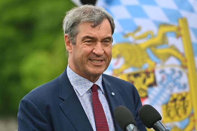 Markus SOEDER (Ministerpraesident Bayern und CSU Vorsitzender) vor bayerischer Flagge,Fahne. Einzelbild,angeschnittenes Einzelmotiv,Portraet,Portrait,Porträt. Einweihung des neuen Ludwig II.-Denkmals auf der Bastion der Corneliusbruecke am 13.06.2026 in Muenchen. *** Markus SOEDER State Premier of Bavaria and CSU Chairman in front of Bavarian flag,flag single image,cropped single motif,portrait,portrait,portrait inauguration of the new Ludwig II monument on the bastion of the Cornelius Bridge on 13 06 2026 in Munich