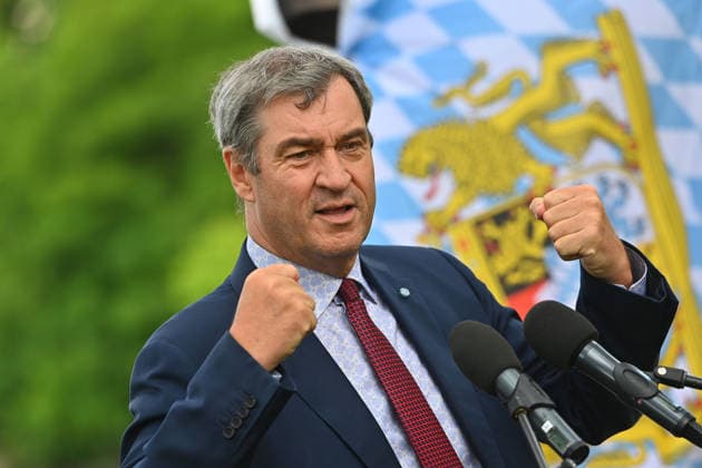 Markus SOEDER (Ministerpraesident Bayern und CSU Vorsitzender) vor bayerischer Flagge,Fahne. Einzelbild,angeschnittenes Einzelmotiv,Portraet,Portrait,Porträt.Gestik, Einweihung des neuen Ludwig II.-Denkmals auf der Bastion der Corneliusbruecke am 13.06.2026 in Muenchen. *** Markus SOEDER Ministerpraesident Bavaria and CSU chairman in front of Bavarian flag,flag single picture,cropped single motif,portrait,portrait,portrait gesture, inauguration of the new Ludwig II monument on the bastion of the Corneliusbruecke on 13 06 2026 in Munich