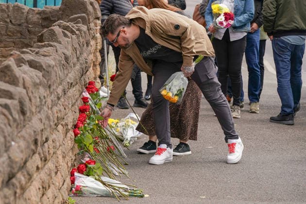 June 13, 2026, Nottingham, East Midlands, UK: Nottingham, UK. James Coates, The Son of Ian Coates, lays flowers on Ilkeston Road in Nottingham. Today marks the third anniversary after Valdo Calocane murdered Barnaby Webber, Grace OÃ¢â‚¬â ¢Malley-Kumar and Ian Coates in Nottingham on 13 June 2026. Nottingham UK  - ZUMAl94_ 20260613_zaf_l94_061 Copyright: xIoannisxAlexopoulosx