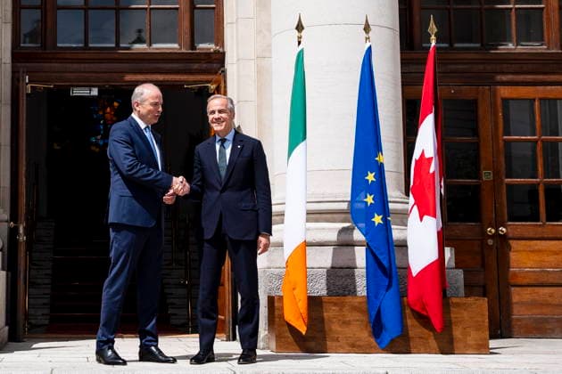 June 13, 2026, Dublin, Ireland: Prime Minister Mark Carney is greeted by Micheal Martin, Ireland s head of government, left, at the Government Buildings in Dublin, on Saturday, June 13, 2026. Dublin Ireland  - ZUMAc35_ 20260613_zaf_c35_013 Copyright: xChristopherxKatsarovx
