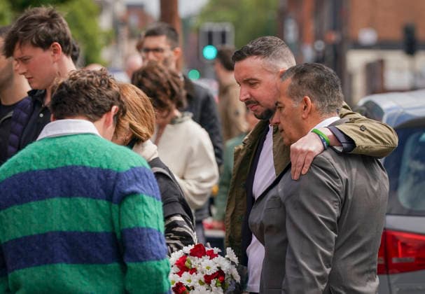 June 13, 2026, Nottingham, East Midlands, UK: Nottingham, UK. Dr Sanjoy Kumar (grey suit) The father of Grace O Malley Kumar, and Lee Coates (holding flowers), the son of Ian Coates, gather on Ilkeston Road in Nottingham. Today marks the third anniversary after Valdo Calocane murdered Barnaby Webber, Grace OÃ¢â‚¬â ¢Malley-Kumar and Ian Coates in Nottingham on 13 June 2026. Nottingham UK  - ZUMAl94_ 20260613_zaf_l94_076 Copyright: xIoannisxAlexopoulosx