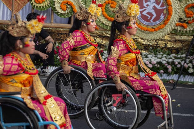 June 13, 2026, Denpasar, Bali, Indonesia: Balinese dancers using wheelchairs perform during a parade for the 48th Bali Arts Festival in Denpasar on Indonesia s resort island of Bali on June 13, 2026. The annual month-long festival, which features inclusive performances from various regencies across the island, aims to preserve and showcase Balinese cultural heritage. Denpasar Indonesia - ZUMAp229 20260613_zip_p229_008 Copyright: xLanaxPriatnax