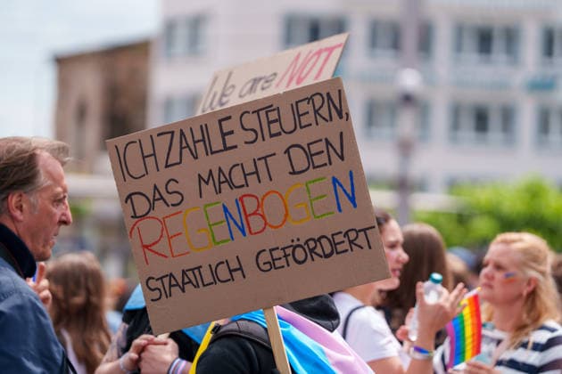 Pride March and Demonstration During CSD in Kassel Germany - Kassel, 13.06.2026 Sign with I pay taxes that™s what makes the rainbow government funded as participants take part in the Christopher Street Day (CSD) march in Kassel. Demonstrators marched from Königsplatz through the city centre before returning to Königsplatz, where rallies and speeches were held before and after the procession. Hundreds of people gathered to advocate for LGBTQ+ rights, equality and diversity. Hesse