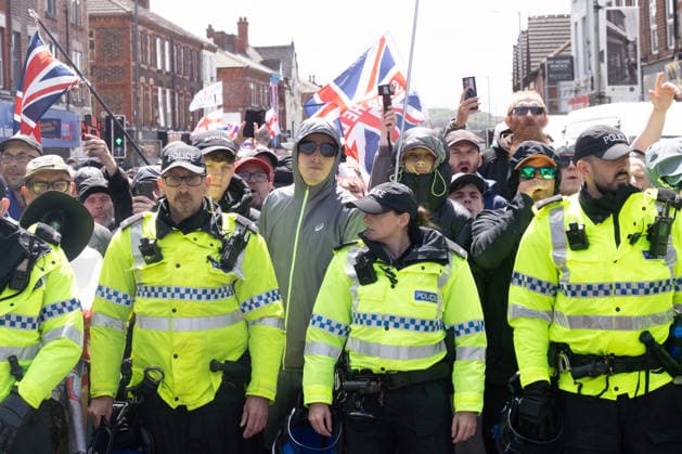 Anti-immigration protest march, Walton, Liverpool, UK, 13 June 2026. A large police presence prevents major disorder at an anti-immigration, pro-deportation protest march in Walton, Liverpool, UK, 13 June 2026., Credit:John Johnson Avalon  Copyright: xJohnxJohnsonx xAvalonx 1109948438