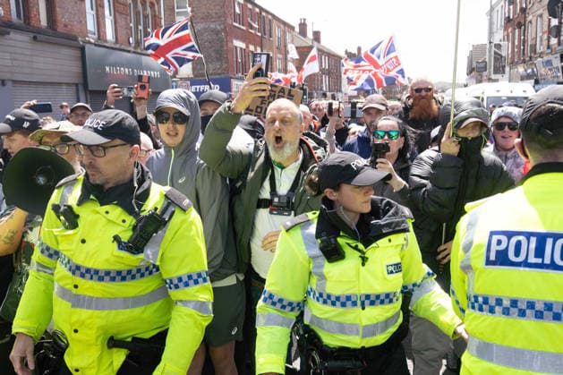 Anti-immigration protest march, Walton, Liverpool, UK, 13 June 2026. A large police presence prevents major disorder at an anti-immigration, pro-deportation protest march in Walton, Liverpool, UK, 13 June 2026., Credit:John Johnson Avalon  Copyright: xJohnxJohnsonx xAvalonx 1109948502