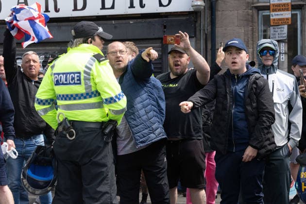 Anti-immigration protest march, Walton, Liverpool, UK, 13 June 2026. A large police presence prevents major disorder at an anti-immigration, pro-deportation protest march in Walton, Liverpool, UK, 13 June 2026., Credit:John Johnson Avalon  Copyright: xJohnxJohnsonx xAvalonx 1109948811