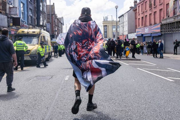 Anti-immigration protest march, Walton, Liverpool, UK, 13 June 2026. A large police presence prevents major disorder at an anti-immigration, pro-deportation protest march in Walton, Liverpool, UK, 13 June 2026., Credit:John Johnson Avalon  Copyright: xJohnxJohnsonx xAvalonx 1109948880