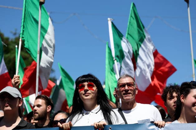 IPA85651808 - Rome, Italy, June 13, 2026: Far-right participants from across Italy march in the remigration rally through the Prati neighborhood during the demonstration organized by the Remigration and Reconquest committee. The march, which began in the afternoon at Piazza della LibertÃ , passed through Via Cola di Rienzo and ended at Piazza Risorgimento. The event was organized in support of a proposed citizens™ initiative bill on remigration.  Copyright: xmarcoxiacobuccix xmarcoxiacobuccix 85651808