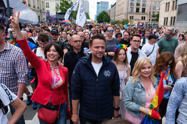 June 13, 2026, Warsaw, Masovian Voivodeship, Poland: Mayor of Warsaw RAFAL TRZASKOWSKI marches alongside thousands of people during the 25th annual Warsaw LGBTQ+ Pride Parade, known in Polish as the Equality Parade. LGBTQ+ people in Poland do not have the right to same-sex civil partnerships, marriage, and child adoption, while also facing homophobia and queerphobia from a largely conservative society. Therefore, the parade is organized primarily as a march for equal rights. Warsaw Poland - ZUMAk204 20260613_zip_k204_011 Copyright: xRomanxKozielx