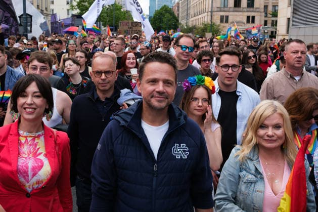 June 13, 2026, Warsaw, Masovian Voivodeship, Poland: Mayor of Warsaw RAFAL TRZASKOWSKI marches alongside thousands of people during the 25th annual Warsaw LGBTQ+ Pride Parade, known in Polish as the Equality Parade. LGBTQ+ people in Poland do not have the right to same-sex civil partnerships, marriage, and child adoption, while also facing homophobia and queerphobia from a largely conservative society. Therefore, the parade is organized primarily as a march for equal rights. Warsaw Poland - ZUMAk204 20260613_zip_k204_012 Copyright: xRomanxKozielx