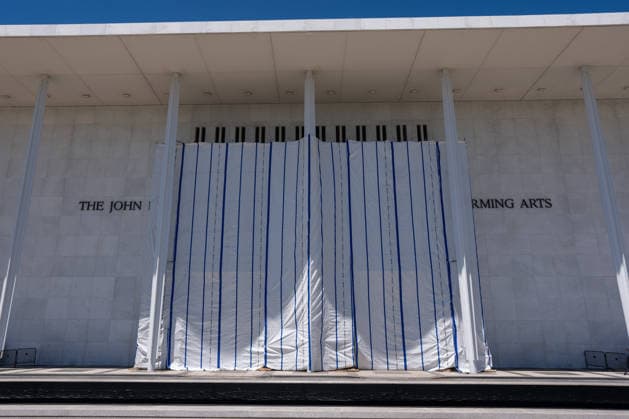 A tarp covers the sign for the Donald J. Trump and The John F. Kennedy Memorial Center for the Performing Arts in Washington, DC on Saturday, June 13, 2026. The Kennedy Center board voted to seek an emergency appeal to block a court order requiring the removal of President Trump s name from the Kennedy Center, but a judge denied their request.  WAP20260613050 AARONxSCHWARTZ