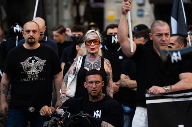 Rally of the ultranationalist group Nucleo Nacional in Barcelona BARCELONA, SPAIN - JUNE 13. Around 50 ultranationalists from Nucleo Nacional group gathered in front of the Spanish government delegation in Barcelona to protest the city s insecurity, which they attribute to immigration. During their speeches, they championed the Aryan race, stating they would fight even if it meant shedding blood, and the Nazi salute was seen. Barcelona Spain Copyright: x xMarcxAsensioxClupÃ sx xJNAxPressx