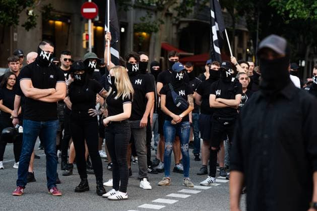 Rally of the ultranationalist group Nucleo Nacional in Barcelona BARCELONA, SPAIN - JUNE 13. Around 50 ultranationalists from Nucleo Nacional group gathered in front of the Spanish government delegation in Barcelona to protest the city s insecurity, which they attribute to immigration. During their speeches, they championed the Aryan race, stating they would fight even if it meant shedding blood, and the Nazi salute was seen. Barcelona Spain Copyright: x xMarcxAsensioxClupÃ sx xJNAxPressx