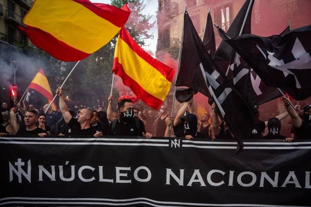 Rally of the ultranationalist group Nucleo Nacional in Barcelona BARCELONA, SPAIN - JUNE 13. Around 50 ultranationalists from Nucleo Nacional group gathered in front of the Spanish government delegation in Barcelona to protest the city s insecurity, which they attribute to immigration. During their speeches, they championed the Aryan race, stating they would fight even if it meant shedding blood, and the Nazi salute was seen. Barcelona Spain Copyright: x xMarcxAsensioxClupÃ sx xJNAxPressx