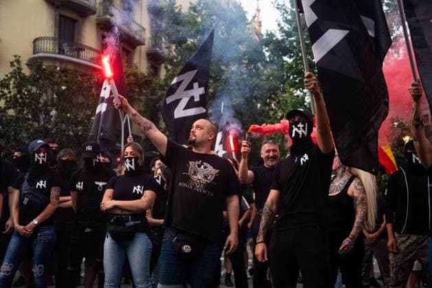 Rally of the ultranationalist group Nucleo Nacional in Barcelona BARCELONA, SPAIN - JUNE 13. Around 50 ultranationalists from Nucleo Nacional group gathered in front of the Spanish government delegation in Barcelona to protest the city s insecurity, which they attribute to immigration. During their speeches, they championed the Aryan race, stating they would fight even if it meant shedding blood, and the Nazi salute was seen. Barcelona Spain Copyright: x xMarcxAsensioxClupÃ sx xJNAxPressx