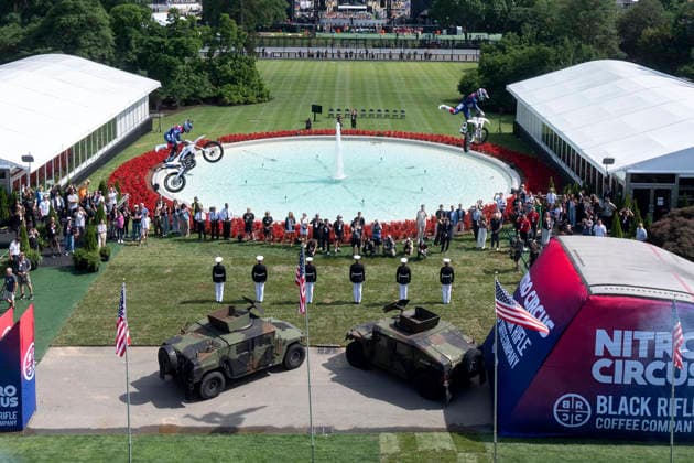 A motor sports athlete and stunt performer does a motorcycle jump ahead of the UFC Freedom 250 fights on the South Lawn of the White House in Washington, DC on Saturday, June 13, 2026.  WASP20260613115 MarkxSchiefelbein