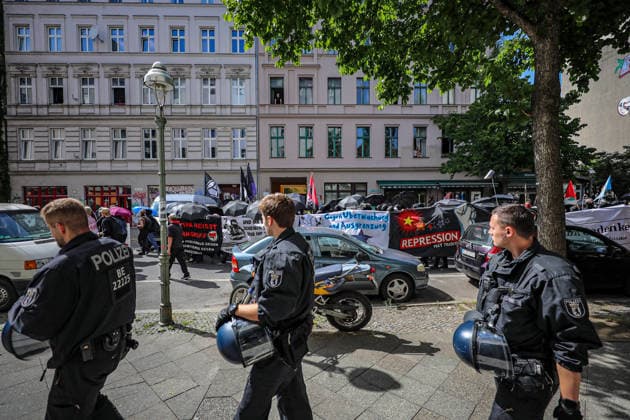 June 13, 2026, Berlin, Berlin, Germany: Demonstrators march through the streets of Berlin, Germany, protesting against the expansion of police surveillance technologies, biometric monitoring systems, facial recognition tools, and the use of artificial intelligence in law enforcement on June 13, 2026. Participants carried banners, flags, umbrellas, and symbolic props, including representations of surveillance cameras, while voicing concerns over privacy rights, state monitoring, and civil liberties. The demonstration was monitored by Berlin police as protesters gathered at several locations across the city demanding greater protections against digital surveillance and data collection. Berlin Germany - ZUMAa268 20260613_zip_a268_011 Copyright: xAbdelrahmanxAlkahloutx