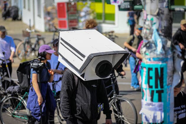 June 13, 2026, Berlin, Berlin, Germany: Demonstrators march through the streets of Berlin, Germany, protesting against the expansion of police surveillance technologies, biometric monitoring systems, facial recognition tools, and the use of artificial intelligence in law enforcement on June 13, 2026. Participants carried banners, flags, umbrellas, and symbolic props, including representations of surveillance cameras, while voicing concerns over privacy rights, state monitoring, and civil liberties. The demonstration was monitored by Berlin police as protesters gathered at several locations across the city demanding greater protections against digital surveillance and data collection. Berlin Germany  - ZUMAa268 20260613_zip_a268_007 Copyright: xAbdelrahmanxAlkahloutx