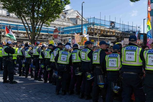 June 13, 2026, Brighton, UK: Brighton, UK. 13 June 2026. Police officers during an anti-immigration protest in the city centre of Brighton. The South East Patriots group hold a march through the centre of Brighton, with about twenty groups under the banner the Carnival Against Fascism organising a counter protest. Police officers kept the two groups apart as tensions were running high. South East Patriots claimed the protest was to demand stronger border control, enforcement of immigration laws, and the deportation of illegal immigrants, with the counter protest groups expressing their resistance against the far right as well as to any form of fascism and racism Brighton UK - ZUMAd99_ 20260613_zap_d99_061 Copyright: xMattxDuckettx