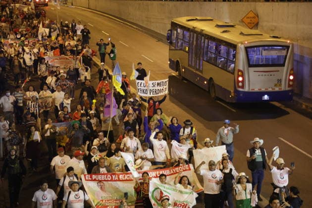 Peruvians march in Lima following shift in election vote count LIMA, PERU - JUNE 13: Hundreds of citizens marched through the streets of downtown after the latest election results were released on June 13, 2026, in Lima, Peru. Supporters and citizen groups marched toward the headquarters of the National Jury of Elections after presidential candidate Keiko Fujimori moved into the lead in the official vote count, following several days in which left-wing candidate Roberto Sanchez had maintained a slight advantage. With 98.25% of ballots processed, the gap between the two candidates is fewer than 5,000 votes. The demonstration reflected the anticipation and political tension gripping the country as the vote count continues in one of the closes  Copyright: x2026xAnadoluxEduardoxAmatxyxLeonxVillanuevax