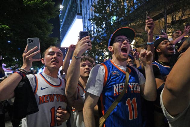 June 13, 2026, New York, New York, USA: June 13, 2026 - New York, NY, USA - New York fans gather at a MSG watch party on 33rd Street to watch the New York Knicks win the NBA Final against the San Antonio Spurs 4-1 in Game 5 with a score of 94-90. The game had a lot of tense moments but the Knicks won in the last few minutes after trailing the Spurs through most of the game. (Photo: Andrea RENAULT Zuma Press) New York USA - ZUMAg115 20260613_faf_g115_017 Copyright: xAndreaxRenaultx